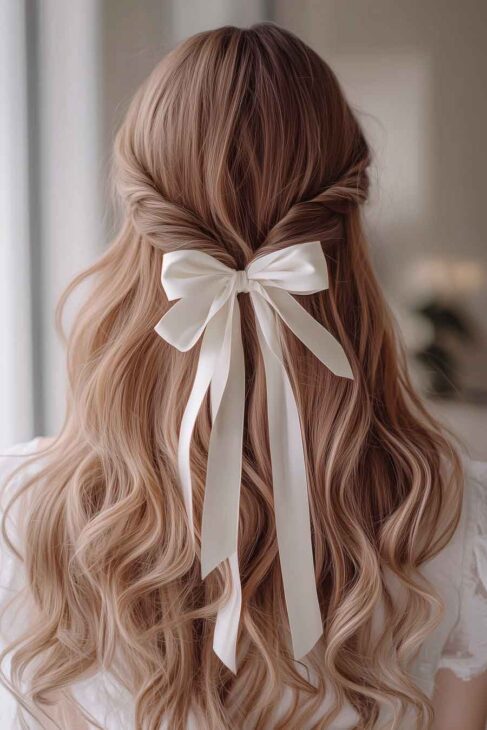 perfect feminine simple bridesmaid hairstyle with white bow