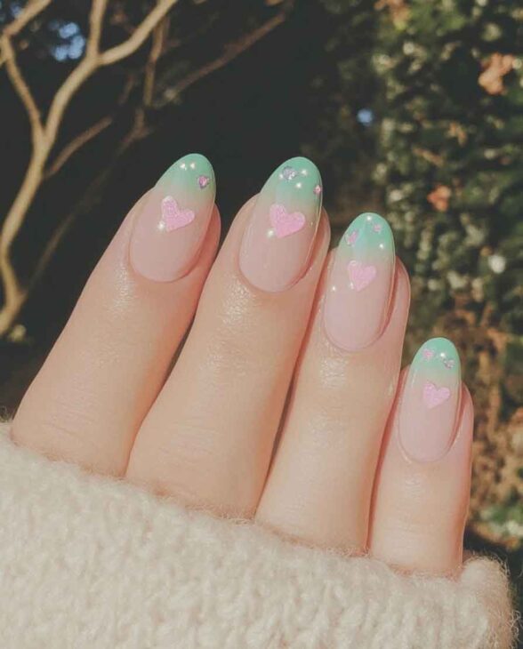 ombre mint green and nude and light pink aesthetic nails fr valentines day with simples heart design