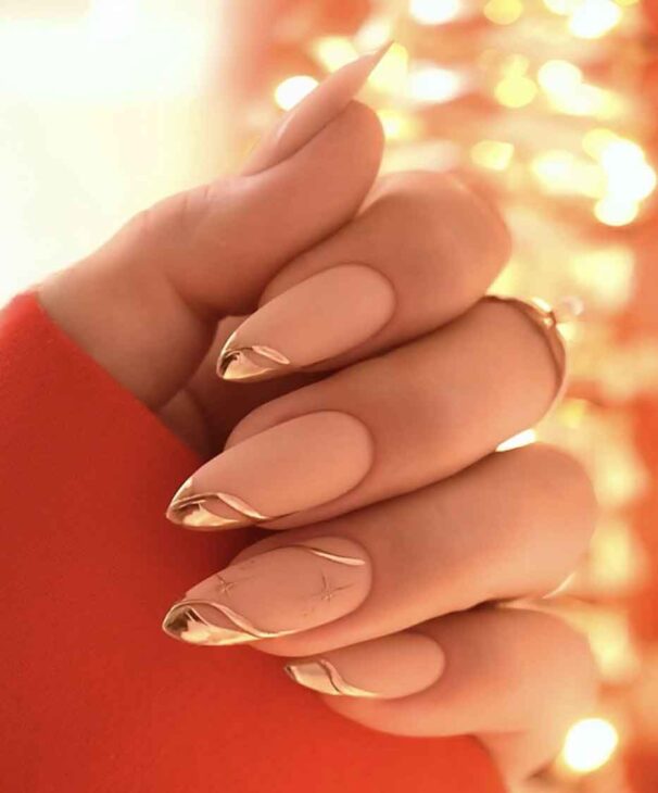 aesthetic chic classy and elegant christmas nails with gold and nude nail polish