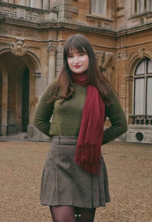 green and red dark academia outfit with grey skirt