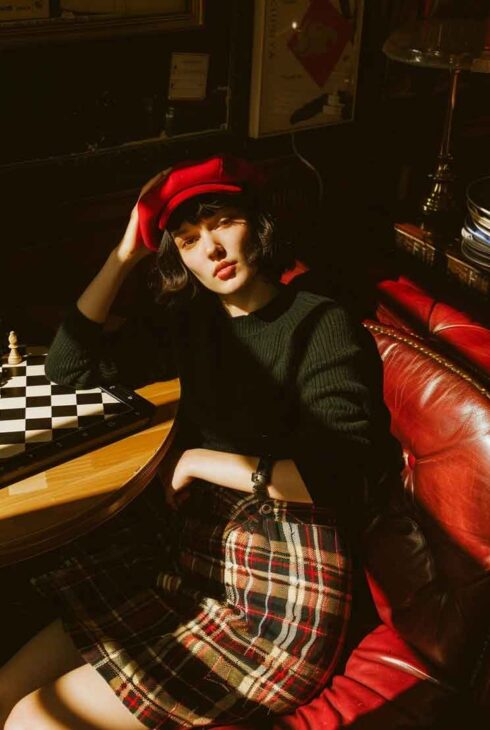 dark academia plaid skirt and red beret outfit concept by the mood guide