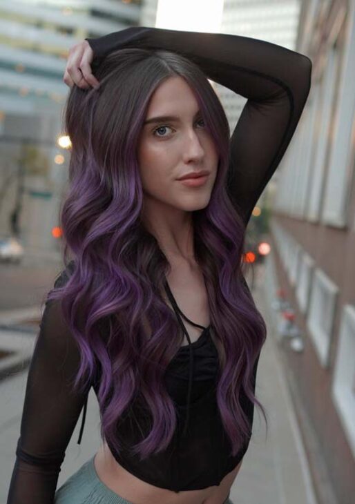 long brown hair with deep purple muted balayage. modern witch aesthetics