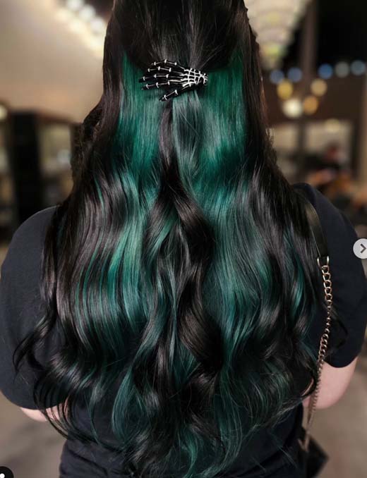 emerald green highlights on black hair. Witch hair color.