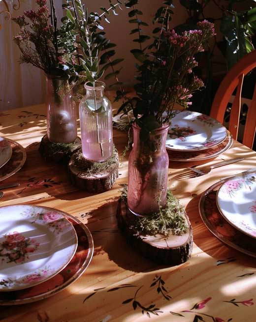 minimalist rustic pink easter spring tablescape with moss