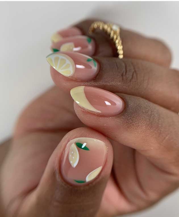 butter yellow nails on black woman skin