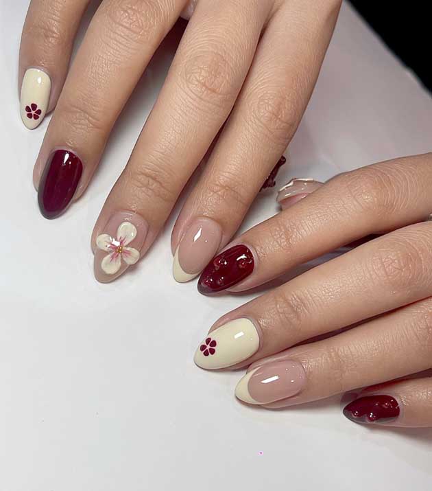 butter yellow with dark red nails