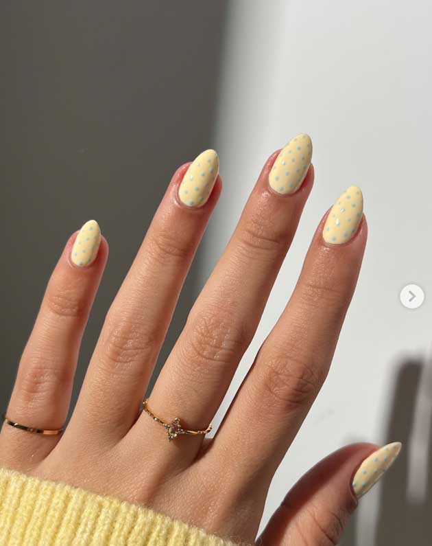 butter yellow with light blue nails