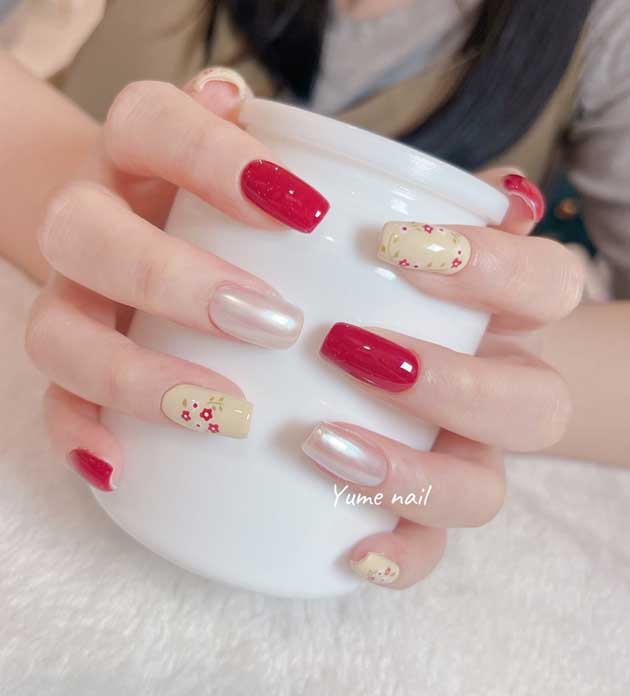 red and butter yellow nails