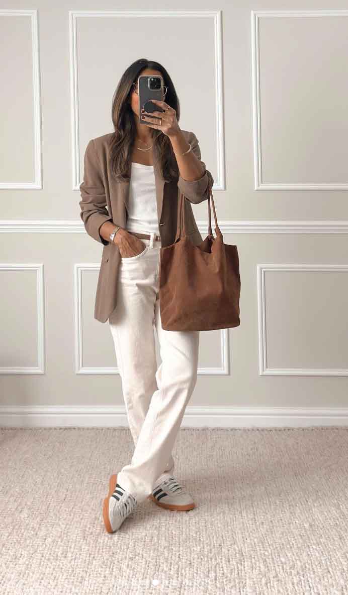 chic casual white denim jeans with brown and sneakers work office outfit