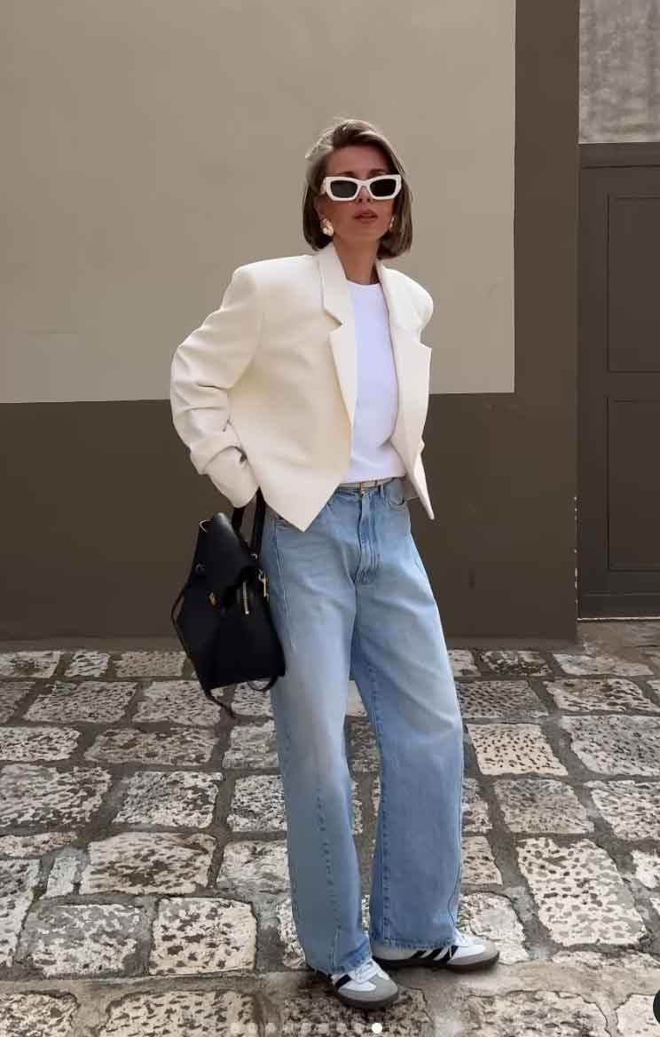 casual modern work outfit with adidas sneakers and denim