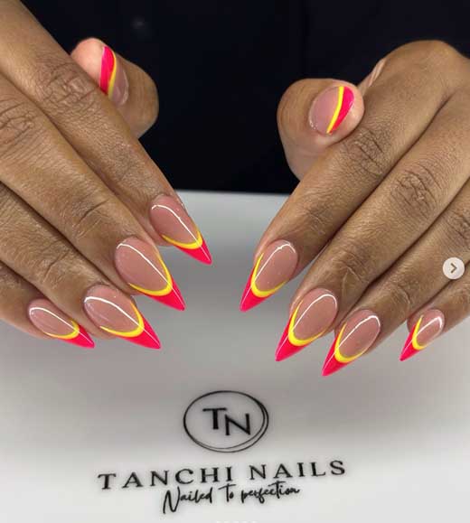 neon pink tips with yellow and glitter nails