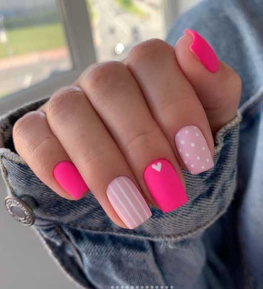 pink neon nails with heart