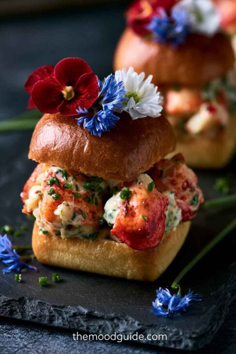 lobster bun with edible flower 4th of July appetizers