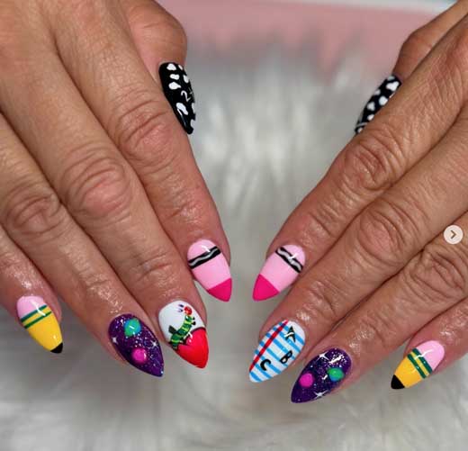 colorful cute and fun back to school nail art with crayons design