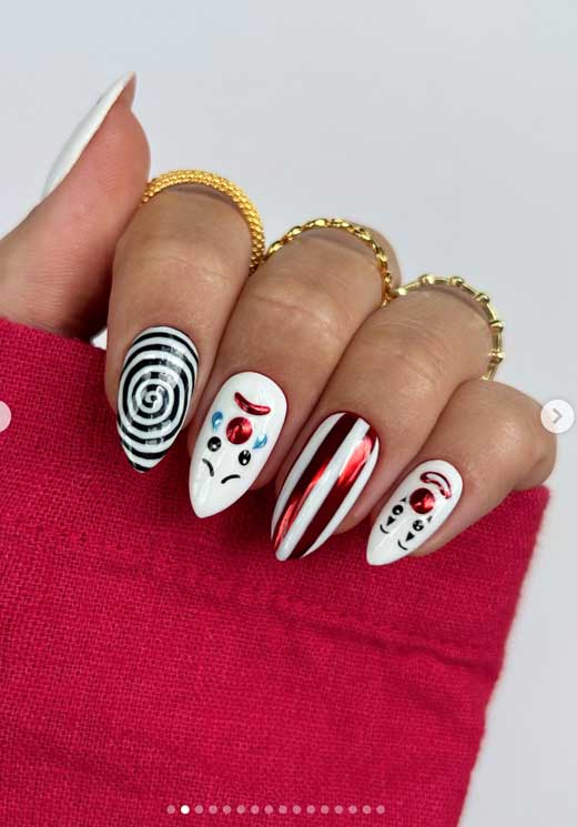 long clown nail art in red and white for cute halloween manicure