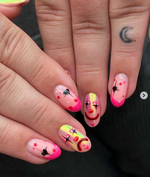 cute pink nail art with clown design for halloween