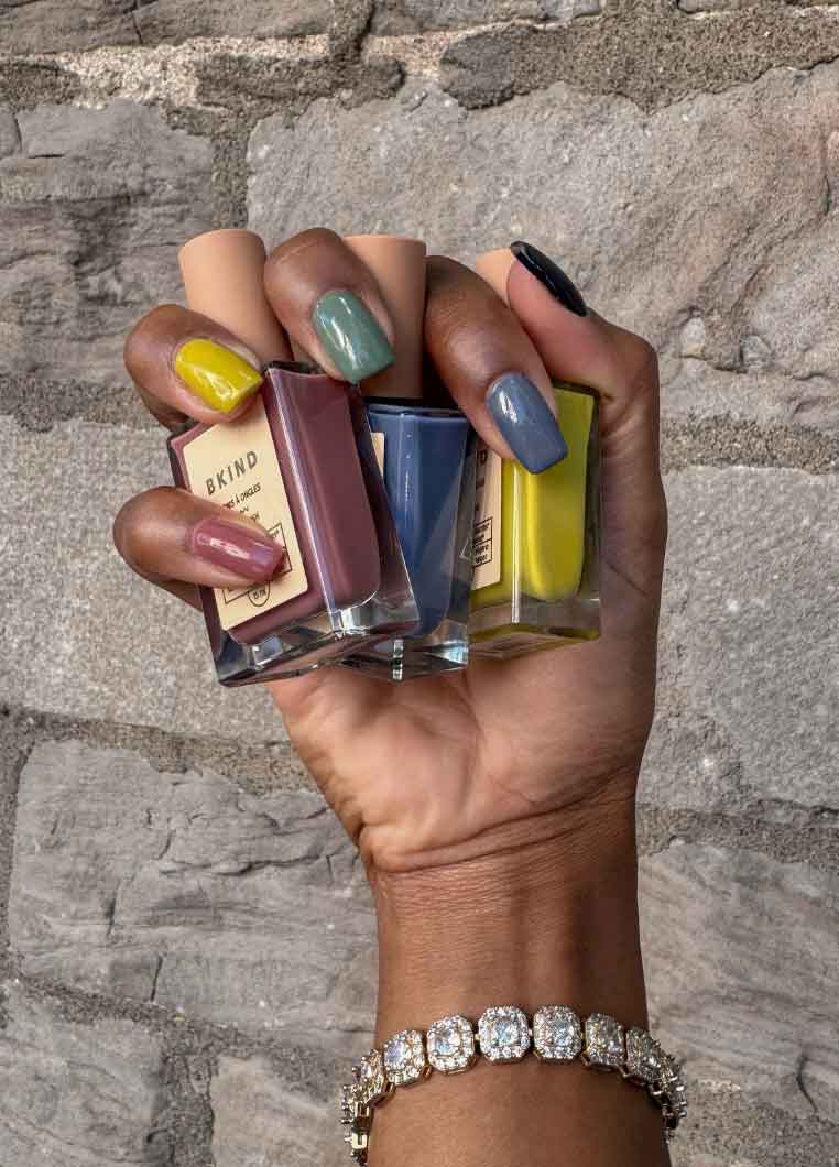 fall 2025 simple aesthetic fall nails on black hands