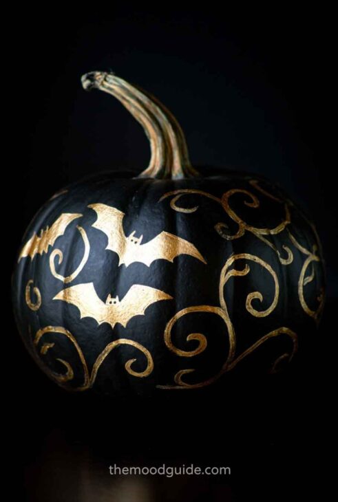 luxury chic black and gold halloween painted pumpkin