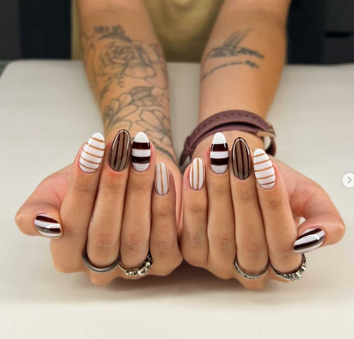 almond brown stripes nails
