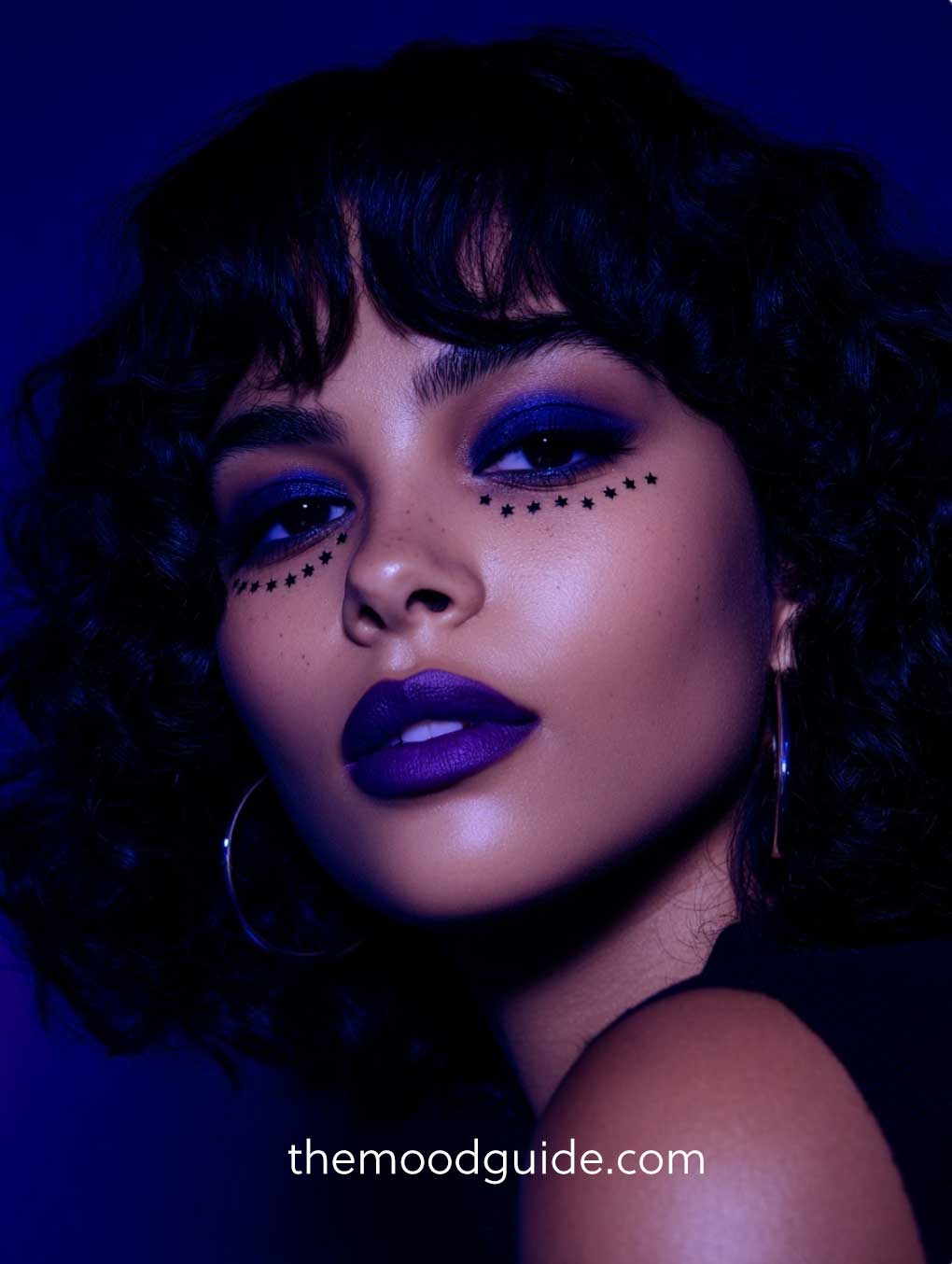elegant dark blue and purple celestial makeup for halloween