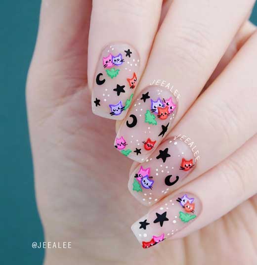 cute halloween nails with cat