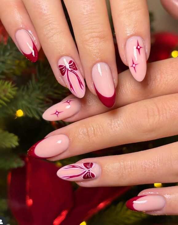 aesthetic burgundy with pink coquette christmas nail design