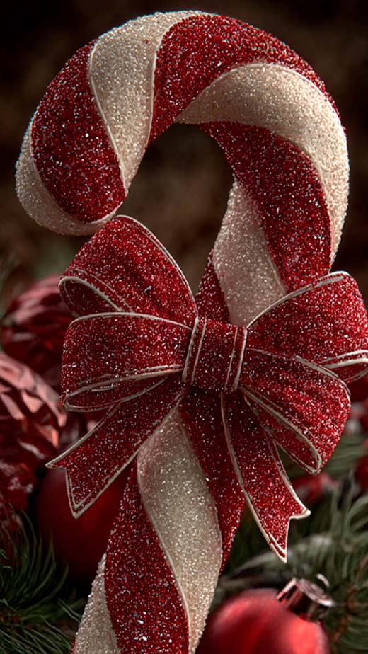 aesthetic cute red and white candy cane with a bow Christmas phone wallpaper