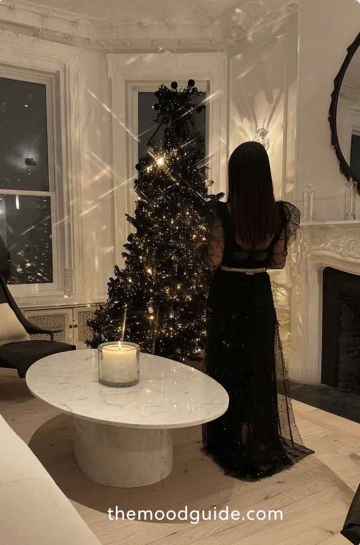 modern luxury christmas trees aesthetic on modern living room with all black dress outfit.