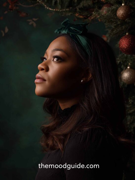 easy and aesthetic christmas elegant hairstyle for afro black woman with dark green headband
