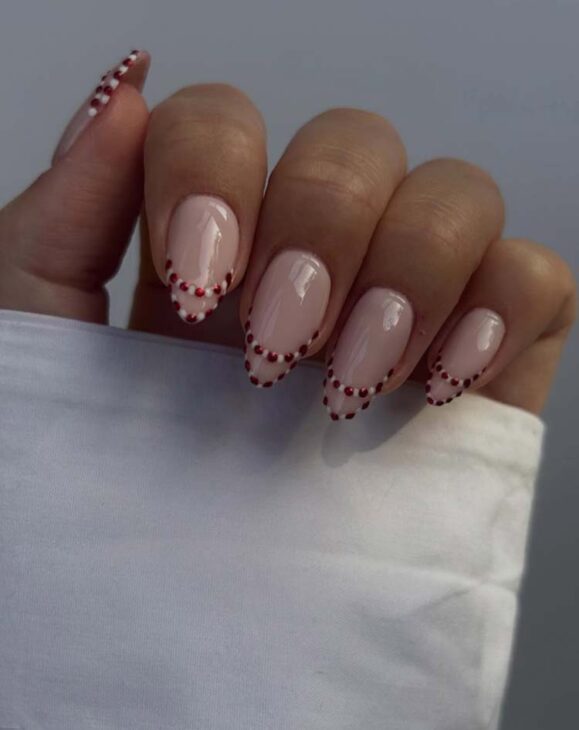 aesthetic candy cane chic elegant minimal christmas nails on nude base