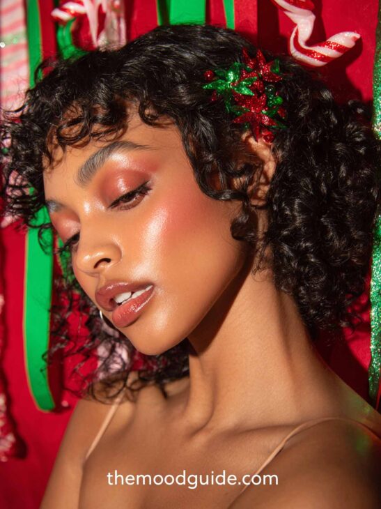 short curly hair christmas hairstyle on black woman with accessory