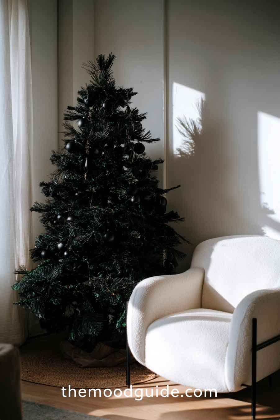 modern minimal chic christmas tree with black ornaments