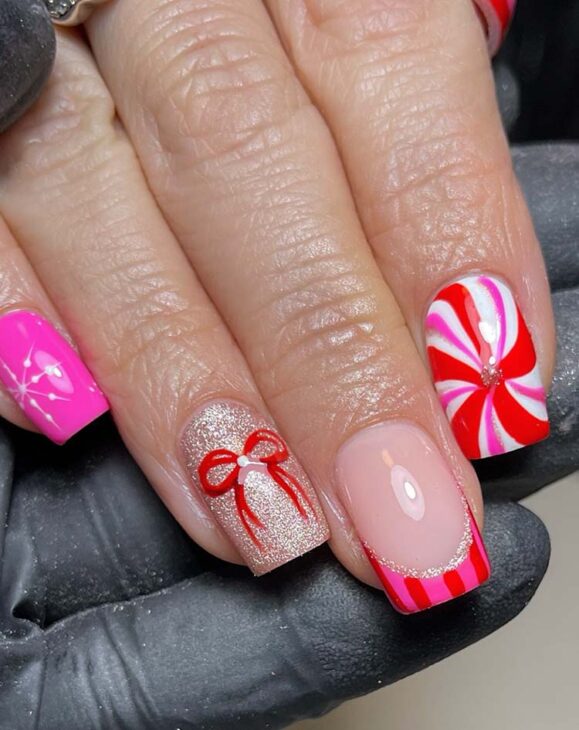 glamorous pink red and gold christmas nails