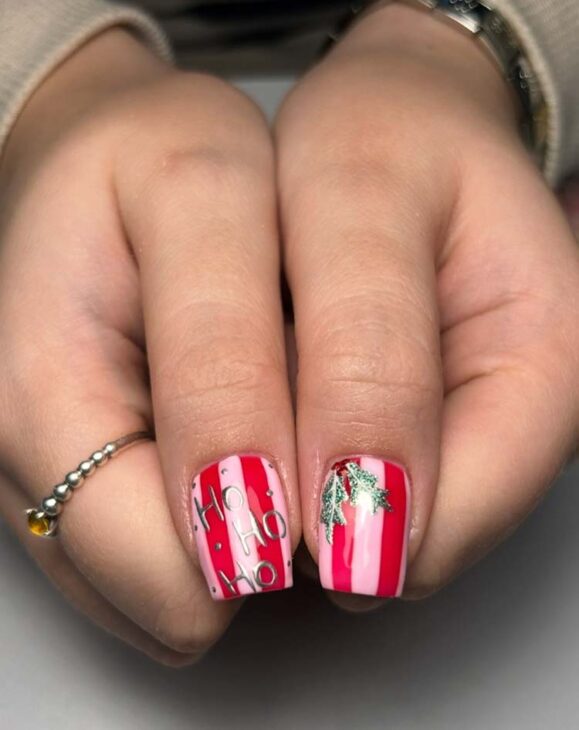 hohoho and holly pink and red stripes on christmas nails 