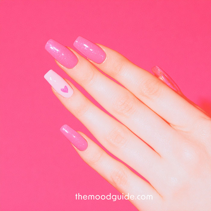 barbie aesthetic pink nails with heart for easy valentines day manicure.