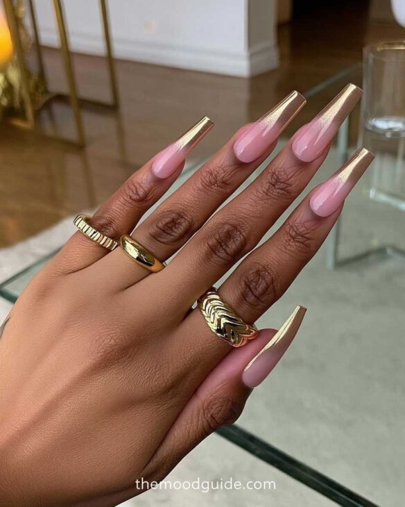 long gold and nude ombre coffin nails on brown skin