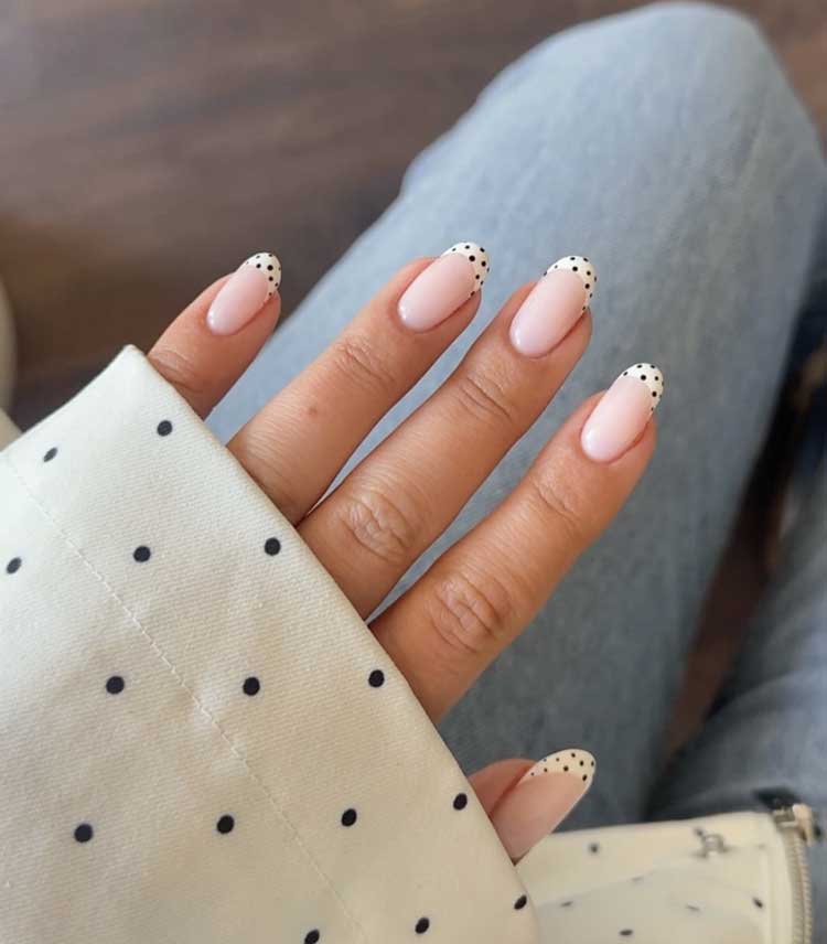 simple easy minimal black and white polka dot french ip nails on neutral base