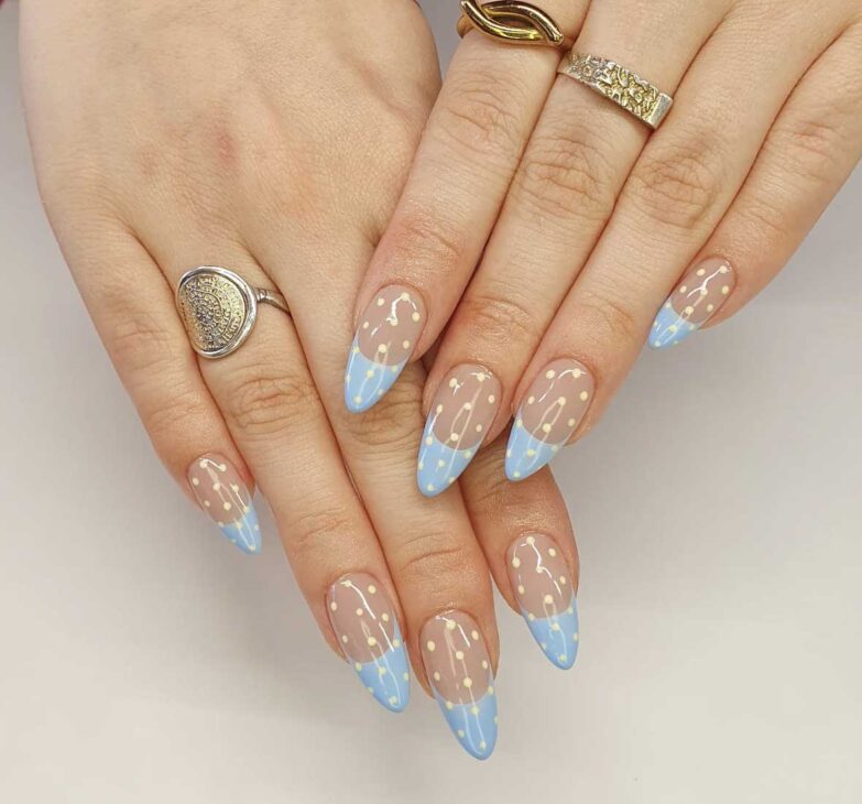 light blue nails french tips with butter yellow polka dots
